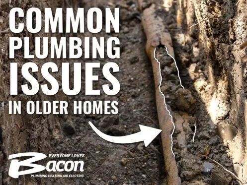 A promotional graphic shows a cracked underground pipe with an arrow pointing to the damage. The text reads "Common Plumbing Issues in Older Homes," with the Bacon Plumbing Heating Air Electric logo in the bottom left corner.