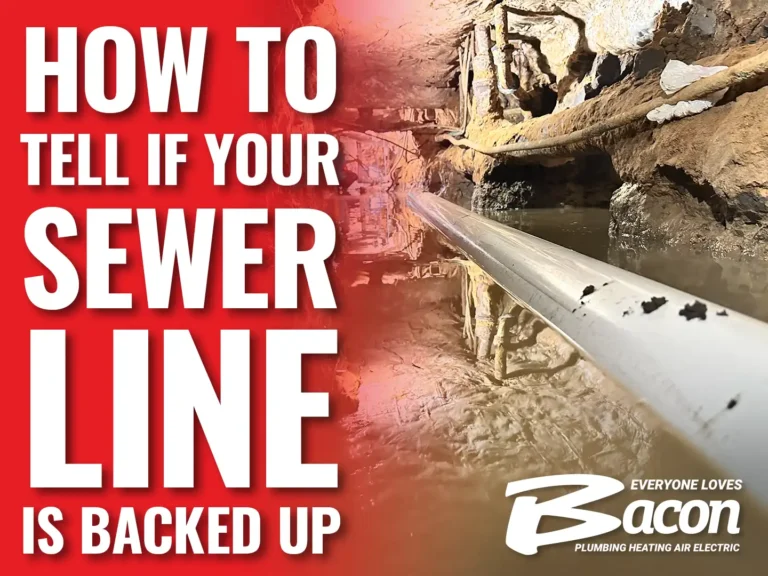 A damaged or clogged sewer pipe running through a dirt tunnel or crawlspace. The image shows a white PVC pipe with visible buildup along its surface. Large white text on a red background reads 'HOW TO TELL IF YOUR SEWER LINE IS BACKED UP'